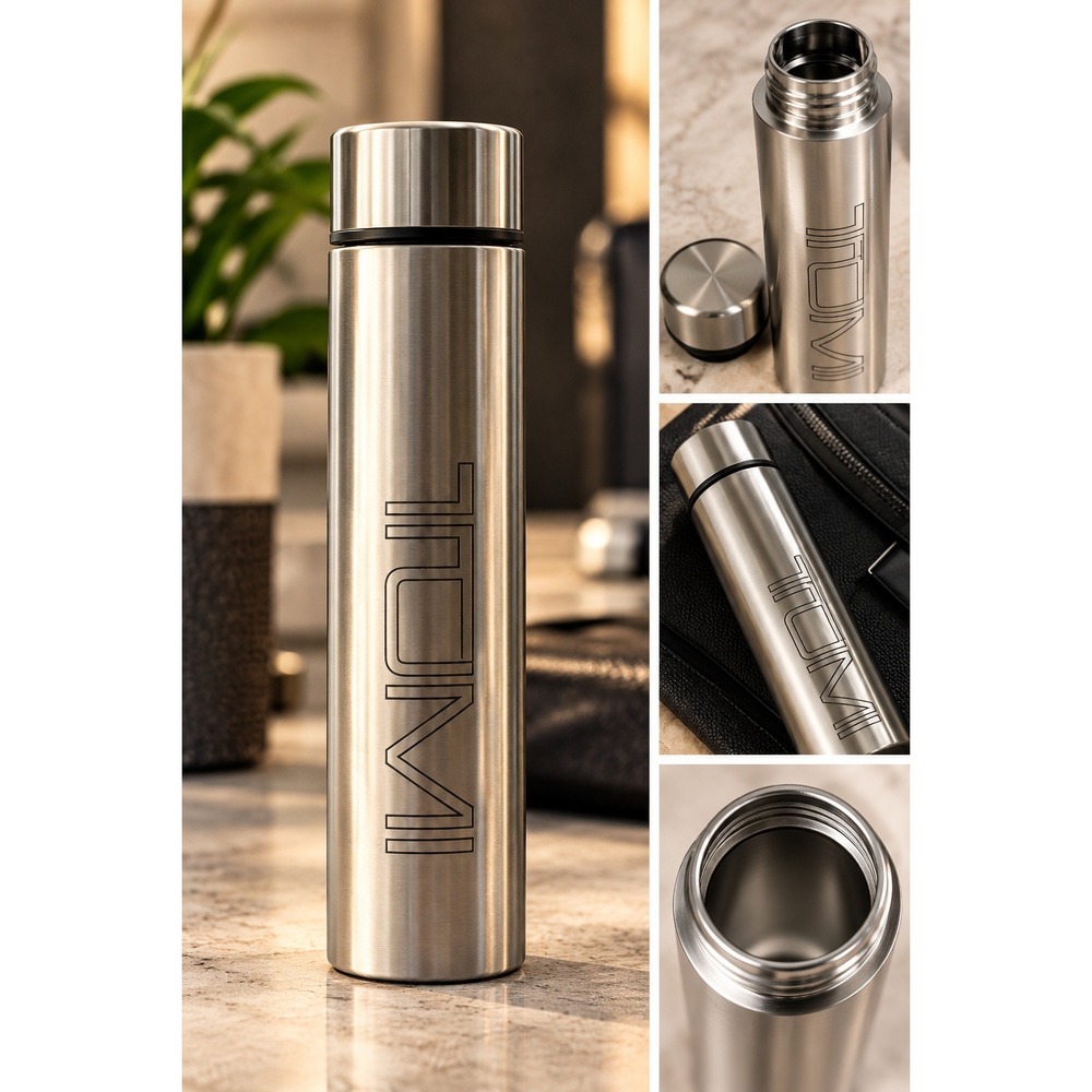 NIB TUMI Water Bottle 17oz Silver Stainless Steel Vacuum Insulated Slim